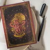 Caderno Paperblanks Midi Harry Potter Gryffindor Journal 120g/m² 13x18cm 144 Páginas Pautado